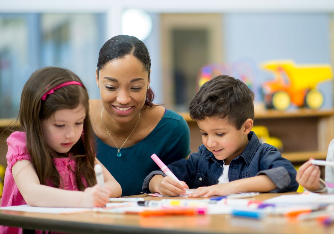 librarian with children drawing