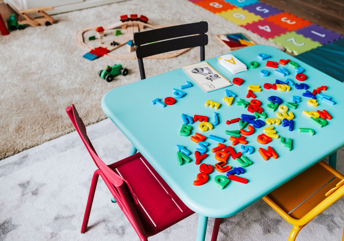 letter magnets on a kids table